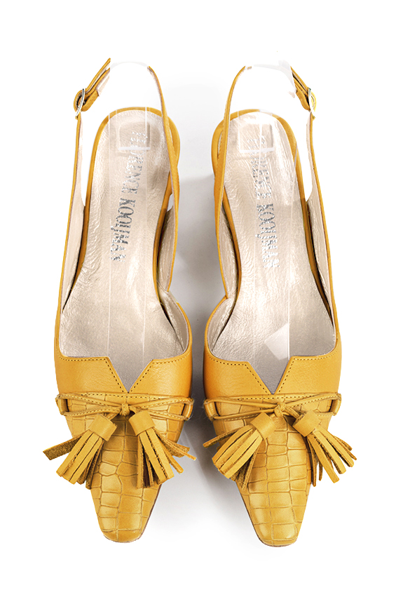 French elegance and refinement for these mustard yellow dress slingback shoes, with a knot, 
                available in many subtle leather and colour combinations. The pretty French spirit of this beautiful pump will accompany your steps nicely and comfortably.
To be personalized or not, with your materials and colors.  
                Matching clutches for parties, ceremonies and weddings.   
                You can customize these shoes to perfectly match your tastes or needs, and have a unique model.  
                Choice of leathers, colours, knots and heels. 
                Wide range of materials and shades carefully chosen.  
                Rich collection of flat, low, mid and high heels.  
                Small and large shoe sizes - Florence KOOIJMAN